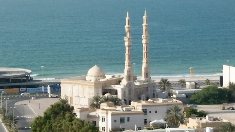 Outdoor roadside billboard advertising on Ajman Corniche, Ajman, UAE