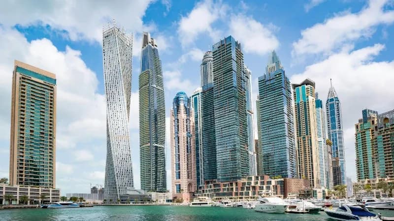Billboard and lamppost advertising along Dubai Marina waterfront, Dubai, UAE
