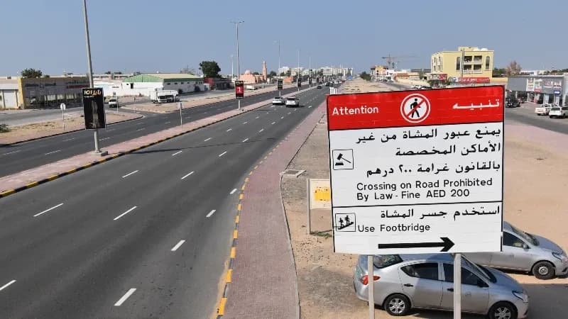 Outdoor roadside billboard advertising on King Faisal Road, Umm Al Quwain, UAE